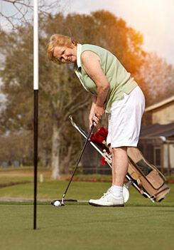 Woman playing golf